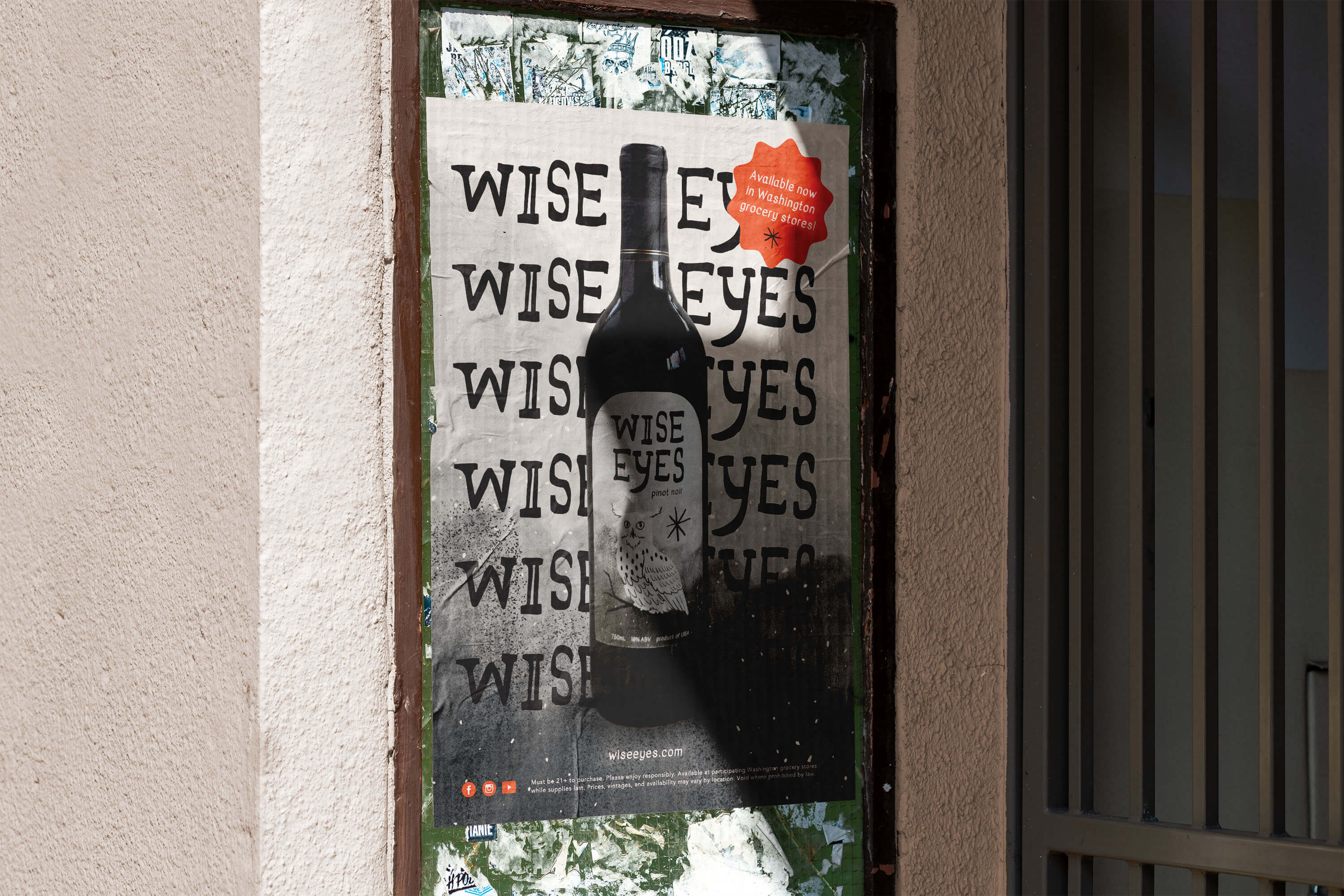 A photo of a poster advertising Wise Eyes wine available in Washington grocery stores